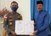 Bupati Natuna dan Polres Natuna Tandatangani NPHD Dukungan Operasional Penanganan Covid-19