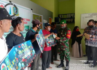 Babinsa Pesisir Timur Dampingi dan Amankan Penyaluran BLT DD
