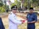 Sempena HUT RI Ke-75 Camat Temiang Pesisir Bagikan 150 Masker Kepada Peserta Upacara