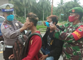 Sinergitas TNI – Polri Cegah Covid-19, Koramil 02/Tarempa dan Polres KKA Tegakkan Disiplin Protokol Kesehatan