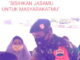 Aksi Babinsa Serda Harun Ginting Bagikan Masker Upaya Memberikan Kesadaran Kepada Warga