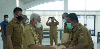 Bupati Asahan Serahkan SPPT dan DHKP PBB-P2 Tahun 2021