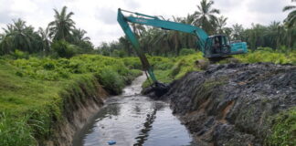Atasi Banjir, Pemkab Asahan Melalui Dinas PUPR Melakukan Normalisasi Saluran Air