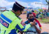 Operasi Keselamatan Seligi 2021, Satlantas Polres Natuna Bagikan Masker Gratis Serta Himbauan Protokol Kesehatan