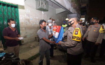 Polda Kepri Gelar Patroli Malam Skala Besar dan Bagikan Bansos PPKM
