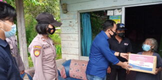 Sat Reskrim Polres Natuna, Sambangi Warga Bagi Sembako