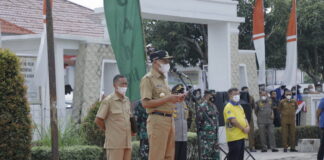 Bupati Asahan Pimpin Apel Penyemprotan Massal Dalam Rangka Mengatasi Penyebaran Virus Covid-19