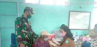 Babinsa Serda Syamsul Fahri Monitoring Penyuntikan Vaksin Covid19 di Puskesmas Jemaja