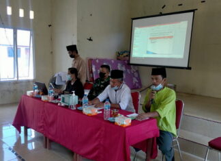 Babinsa Serda Olih Solihin Hadiri Rapat Rembuk Stanting di Desa Ulu Maras