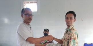 PT LUK Bagikan Bingkisan Idul Fitri 130 Kis Minuman Kaleng ke Warga Dusun 1 Desa Laboh