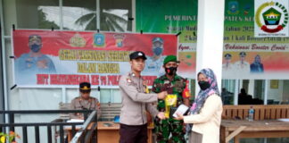 Babinsa Koramil 07/Palmatak Lakukan Pam di Gerai Vaksinasi UPT Puskesmas Palmatak