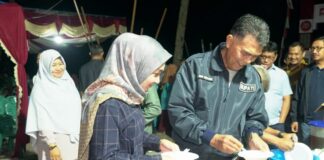 Bupati Natuna ‘Ngemping Padi’ di Pekan Expo Pulau Akar 2022