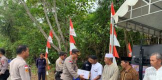 Hari Bhayangkara ke 77, Polres Natuna Bangun Fasilitas Air Bersih dan Bagi Sembako