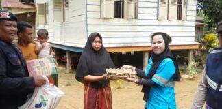Brimob Kompi 1 Yon B Pelopor Polda Aceh Bersama PT IBAS Salurkan Bantuan Sosial