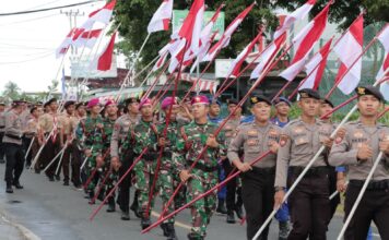 Semangat Kemerdekaan, Polres Lingga Bersama TNI- Polri dan Instansi Gelar Kirab Bendera Merah Putih
