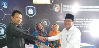 Diskominfo 50 Kota Gelar Sertijab dan Perpisahan Purnabakti PNS