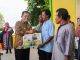 Silaturahmi dengan Masyarakat Pulau Buluh, Gubernur Ansar Serahkan Berbagai Bantuan