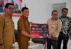 Sekda Natuna Buka Sosialisasi dan Serah Terima Kartu Kredit Pemerintah Daerah