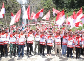 Menjelang Hari Kemerdekaan Republik Indonesia Ke 79, Pemkab Asahan Laksanakan Pengibaran Bendera Merah Putih Di Wisata Alam Air Terjun Ponot