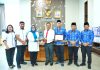 Bupati Simalungun Terima Penghargaan Paritrana Award Tahun 2024