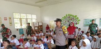 Bhabinkamtibmas Bosar Maligas Tinjau Makan Sehat Bergizi di SDN 091711 Sembari Menjaga Keamanan Dan Ketertiban