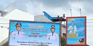 Terkesan Disengaja, Reklame Eks Wali Kota Pematangsiantar Dibiarkan Terpampang Dengan Logo Pemko Pematangsiantar