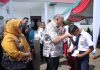Bupati Asahan Serahkan BPJS Kesehatan Gratis dan KIP Kepada Masyarakat