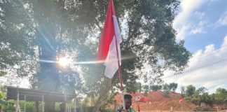 Merah Putih Berkibar di Nongsa, Satgas TMMD Kodim 0316/Batam dan Warga Sambau IV Kibarkan Semangat Nasionalisme