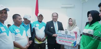 Bupati Asahan Serahkan Penghargaan kepada Insan Olahraga Berprestasi PON Aceh-Sumut 2024
