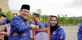 Komitmen Kesehatan Berbuah Apresiasi, Bupati Bengkalis Sabet Dua Penghargaan Nasional