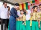 Amsakar dan Li Claudia Bagikan KIA di SDN 006 Batam Kota, Perkuat Identitas dan Hak Anak