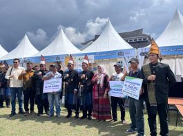 Momentum HUT Simalungun, Bupati dan Wakil Bupati Serahkan Santunan BPJS Ketenagakerjaan