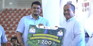 Hari May Day, Bupati Asahan Terima 1.700 Kartu BPJS Ketenagakerjaan