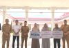 Bupati Aceh Jaya Serahkan Simbolis Santunan Klaim BPJS Ketenagakerjaan bagi Ahli Waris Aparatur Desa dan Pekerja Rentan