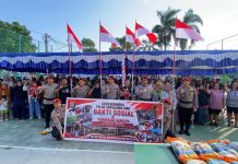 Ditreskrimsus Polda Kepri Bagikan Ratusan Bendera Merah Putih dan Sembako, Perkuat Semangat Kebangsaan