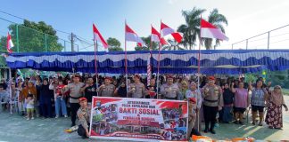 Ditreskrimsus Polda Kepri Bagikan Ratusan Bendera Merah Putih dan Sembako, Perkuat Semangat Kebangsaan