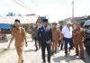 Genjot Pembangunan, Bupati Al-Farlaky Mulai Aspal Jalan Sungai Raya–Gajah Mentah